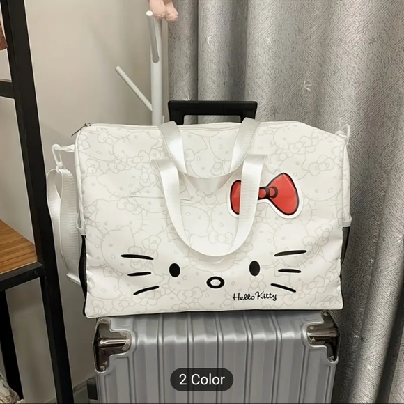 Sanrio Hello Kitty travel bag. Color: White with grey Hello Kitty designs throug - Picture 3 of 13